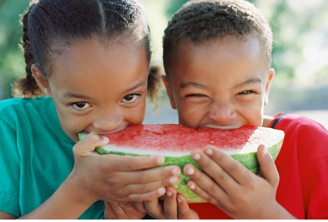 Children eating a watermelon